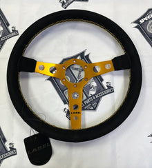 The Daytona | Black Alcantara Suede | Gold Spoke | Gold Stitch