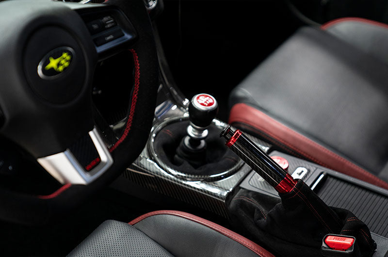 OLM Signature Series Ebrake Handle (Black Carbon w/Red) - 2015-2021 WRX & STI / 2013-2022 FR-S / BRZ / 86 / 2014-2018 Forester / 2013+ *Crosstrek